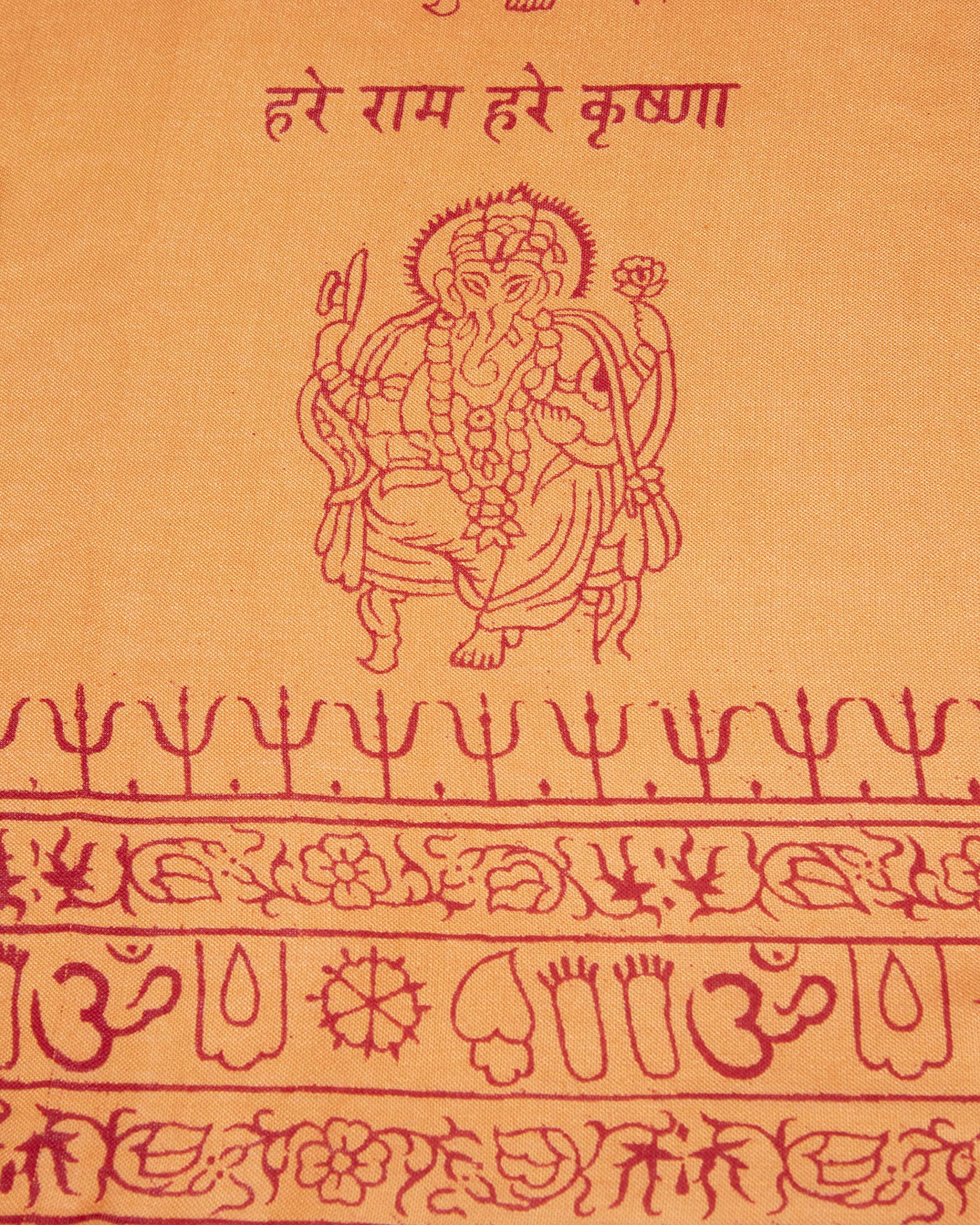 Detail of orange Ganesha yoga shawl, soft rayon viscose spiritual wrap.